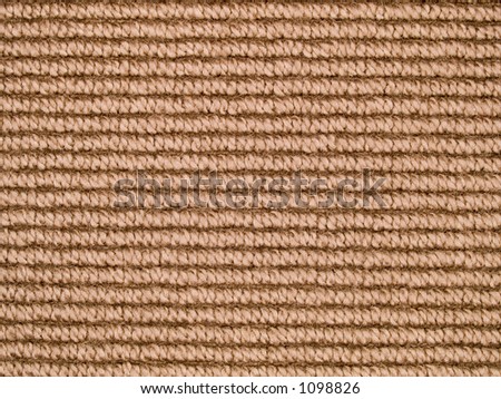 Stock macro photo of the texture of brown fabric.  Useful for layer masks and abstract backgrounds.