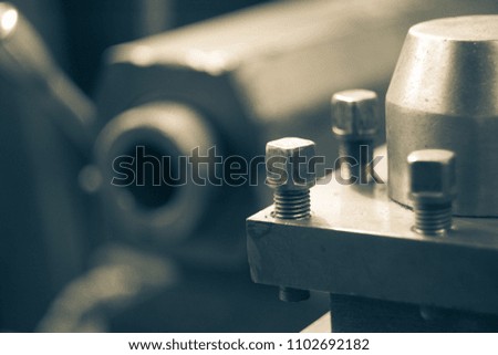 Unscrewed bolts on one of the parts of the bench
