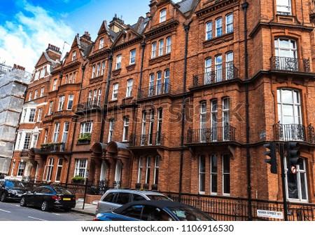 Red Brick Historic Buildings in English style on Green street, Westminster. London
