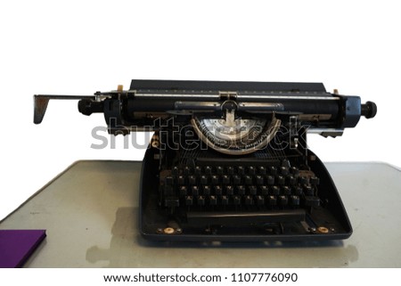 Vintage typewriter on the table on white background                    