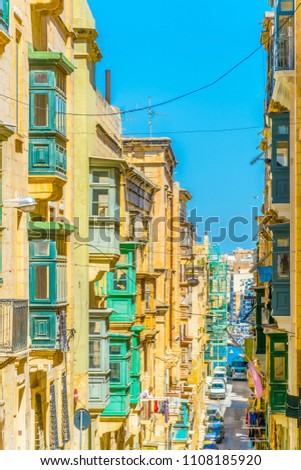 Facades of historical houses in the old town of Valletta, Malta
