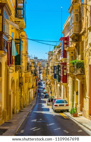 View of a narrow street in the historical center of Senglea, Malta
