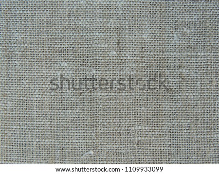 Natural linen flax textured fabric background.