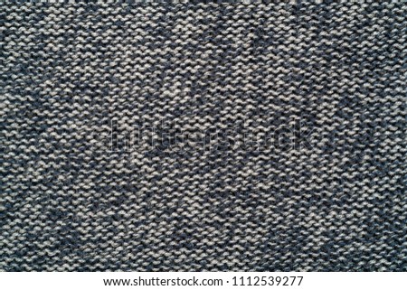 Knitted gray woolen cloth.