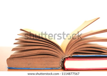 Close-up of old books opened White background selective focus and shallow depth of field