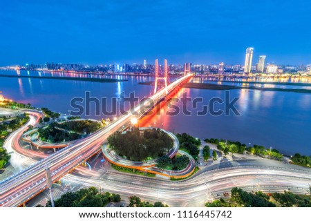 
Asia's largest across the rivers in Shanghai landmarks a spiral bridge at night 