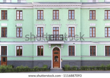 facade of an old green building