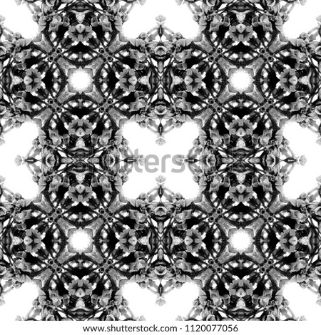 Abstract seamless pattern. Black and White background. Kaleidoscope from flowers. Hydraulic tile design.