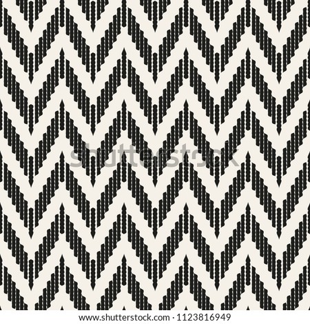 Abstract geometric zigzag seamless pattern in black and white, vector.Modern graphic design