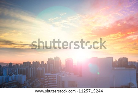 City at sunset colorful sky background

