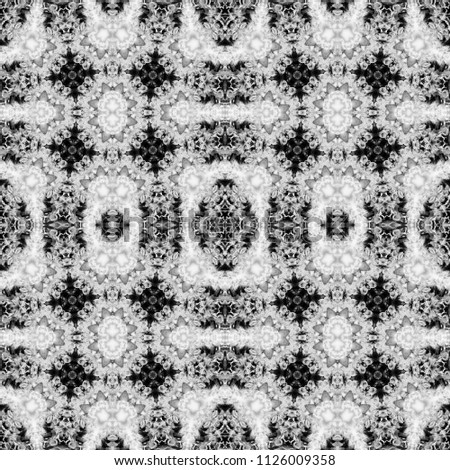 Abstract seamless pattern. Black and White background. Kaleidoscope from flowers. Hydraulic tile design.          