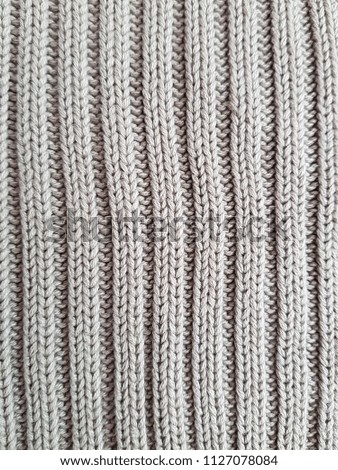 Texture knitted white cloth. Handmade.