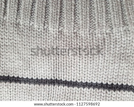 Knitted texture made of natural fabrics.