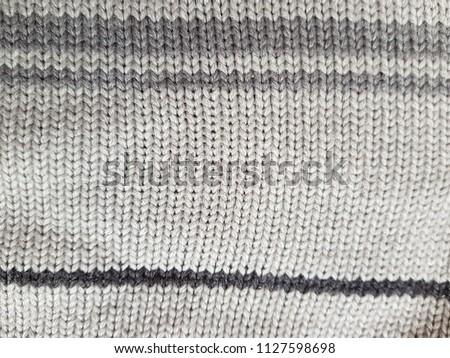 Knitted texture made of natural fabrics.