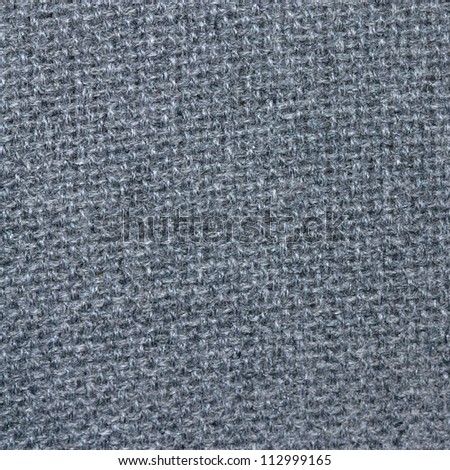 old grey wool fabric texture background, natural wool upholstery closeup