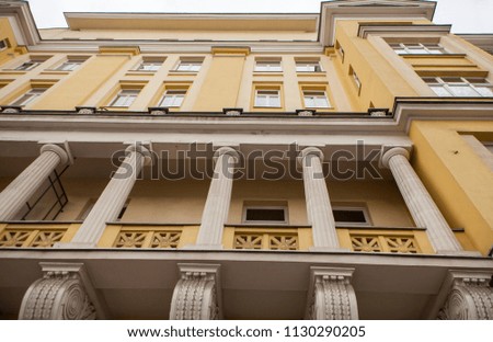 Facade of an ancient building with columns