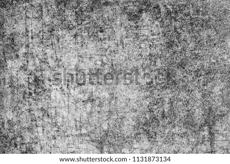 The texture is black and white in grunge style. Abstract monochrome background. Pattern of chips, cracks, scuffs, dust, stains