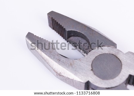 universal pliers on white background