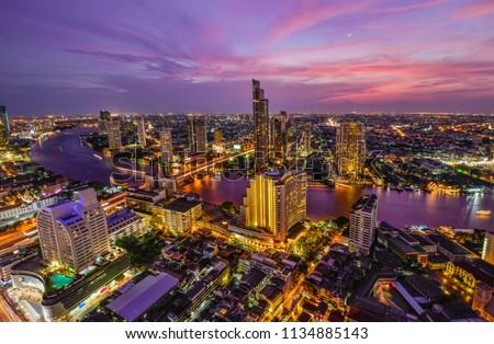 Bangkok cityscape and Chaophraya River at twilight time