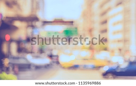 Abstract blur image of  Road on day time  with bokeh for background usage . (vintage tone)