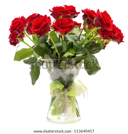 Roses bouquet in glass vase with ribbon isolated on white background
