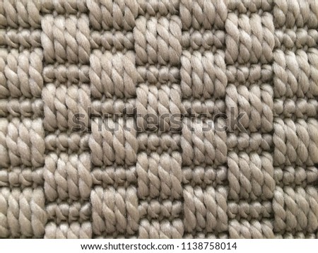 Interlacing of threads. Background, texture, carpet.