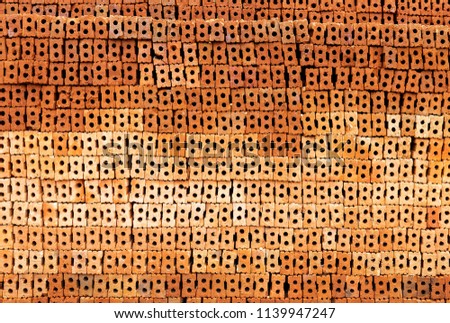 Red brick wall texture background, stack of brick, wholesale supplier of brick, construction site
