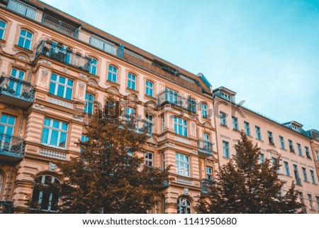 orange residential buildings in the heart of berlin