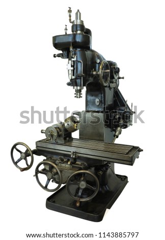 Vintage old drilling bench press isolated over white background