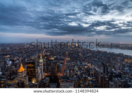 New York City sunset skyline aerial view with office buildings,skyscrapers and Hudson River.