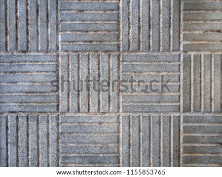 Textured background. Concrete tiles with the correct geometric pattern. Light gray tones.