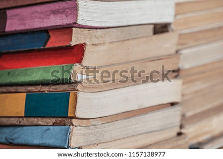 stack of books background. many books piles. (books)