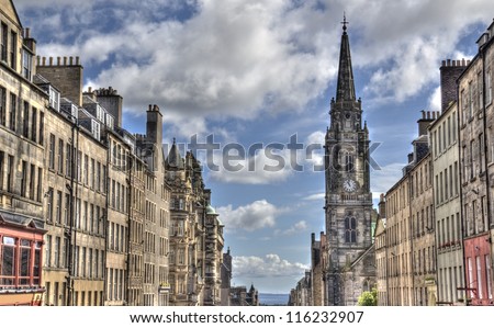 Historical houses and church tower on the Royal Mile main street of Edinburgh, Scotland, UK