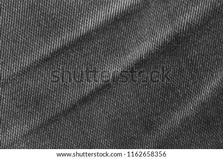 Black jean background texture for design, copy space.