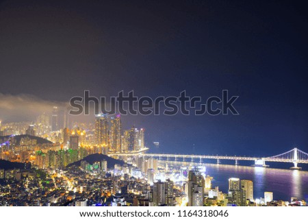  Busan city and Gwangan Bridge with beautiful sky on the Night time, South Korea.