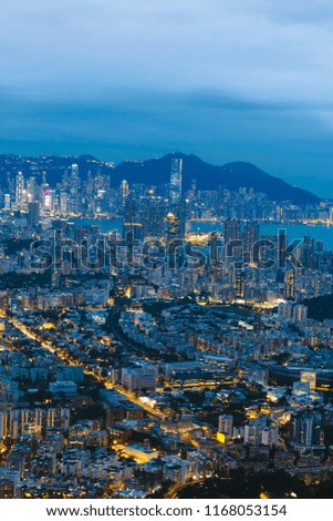 Beautiful View of Hong Kong City at Evening, night with Blue twilight and road car warm light.