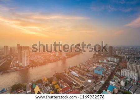 Urban city downtown skyline over river curved, Bangkok Thailand