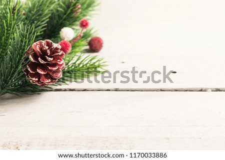 Christmas fir branches with different decorations. Rustic Christmas. Top view flat lay. White old desk.