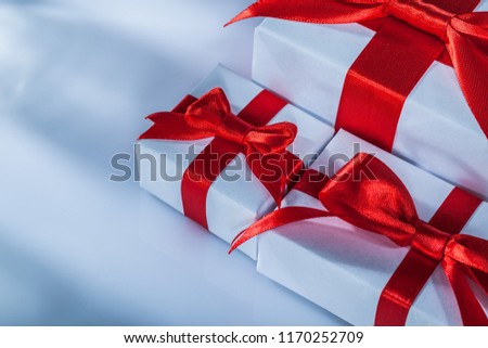 Composition of red gift boxes on white background.