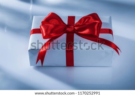 Red gift box on white background.
