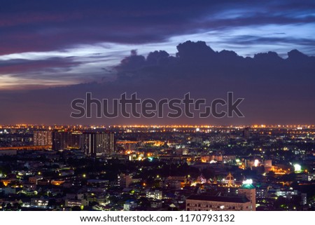 scenic of aerial view from rooftop of cityscape on sunset twilight skyline