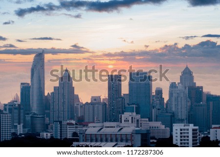 Bangkok business and travel landmark famous district urban skyline aerial view at dusk.