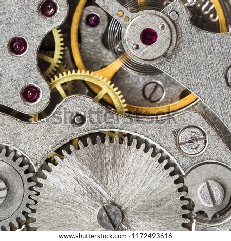 movement of vintage steel mechanical watch close up