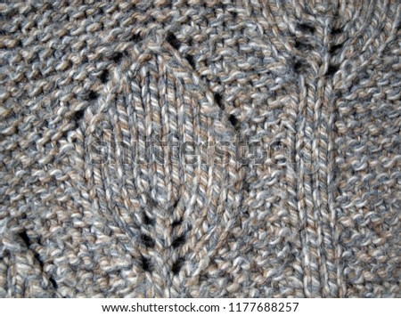 knitting pattern in handmade pullover of wool in natural colors