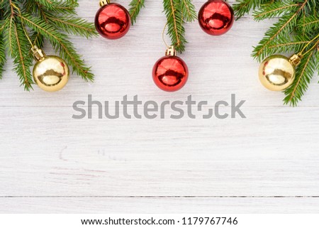 Christmas background - frame of Christmas tree branches and balls