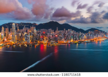 Panoramic view of Hong Kong island and Victoria harbor in sunset