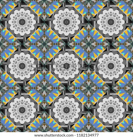 Symmetrical layout. Bed sheets and interior. Colorful ethnic patterned background in blue, brown and gray colors. Seamless abstract geometric pattern. Gift wrapping paper.