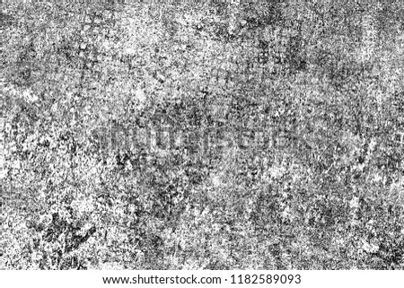 The texture of cracks, chips, scuffs on a white background. Monochrome gloomy grunge background. Pattern of spots, dust, dirt on old surface