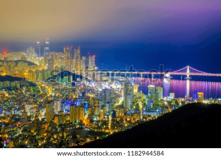 Aerial view of Busan city with Gwangan bridge at nighttime, South Korea.