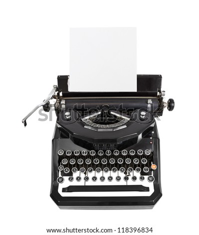 Classic vintage black typewriter isolated with paper.